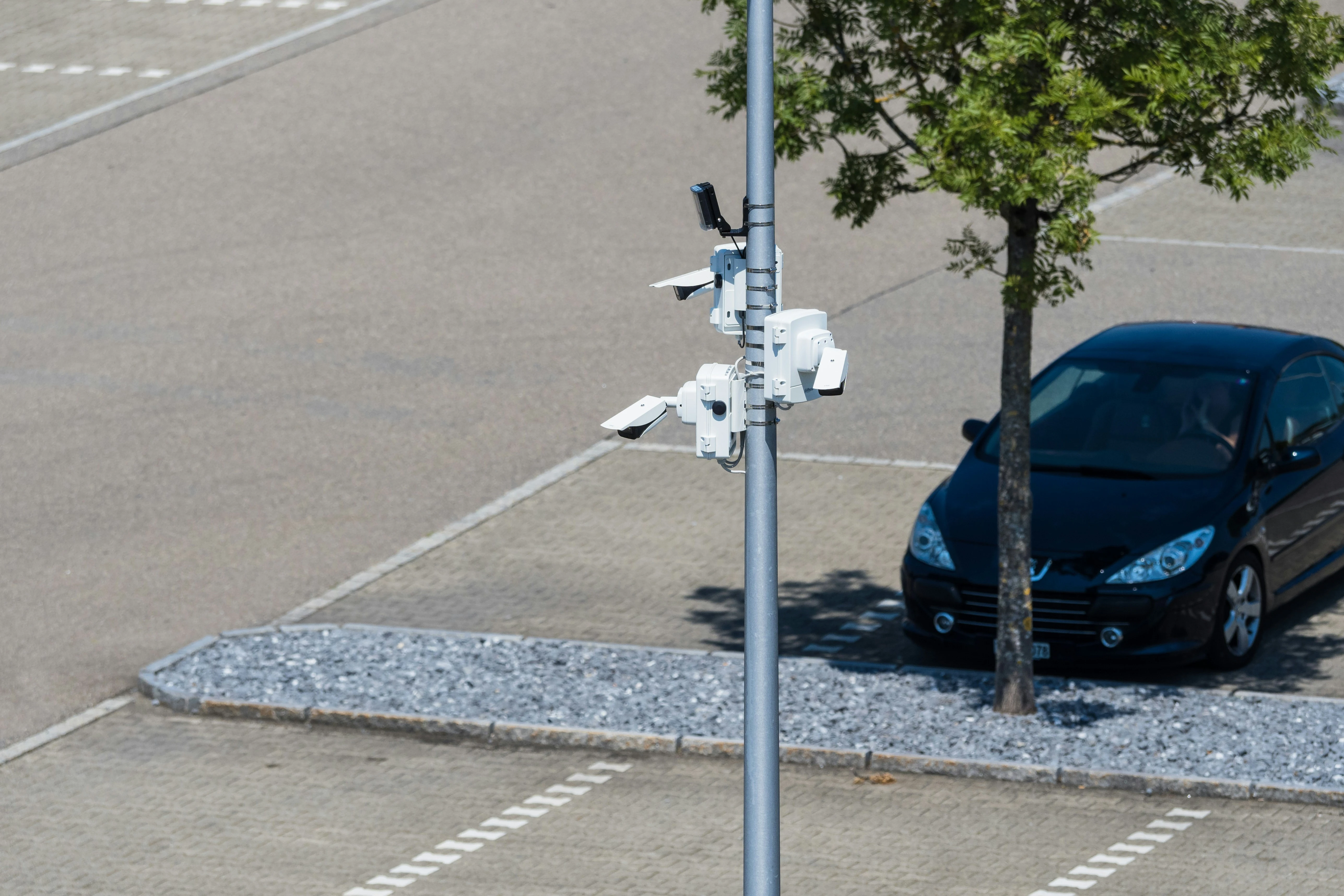 Car looking for parking space in a Belgian city